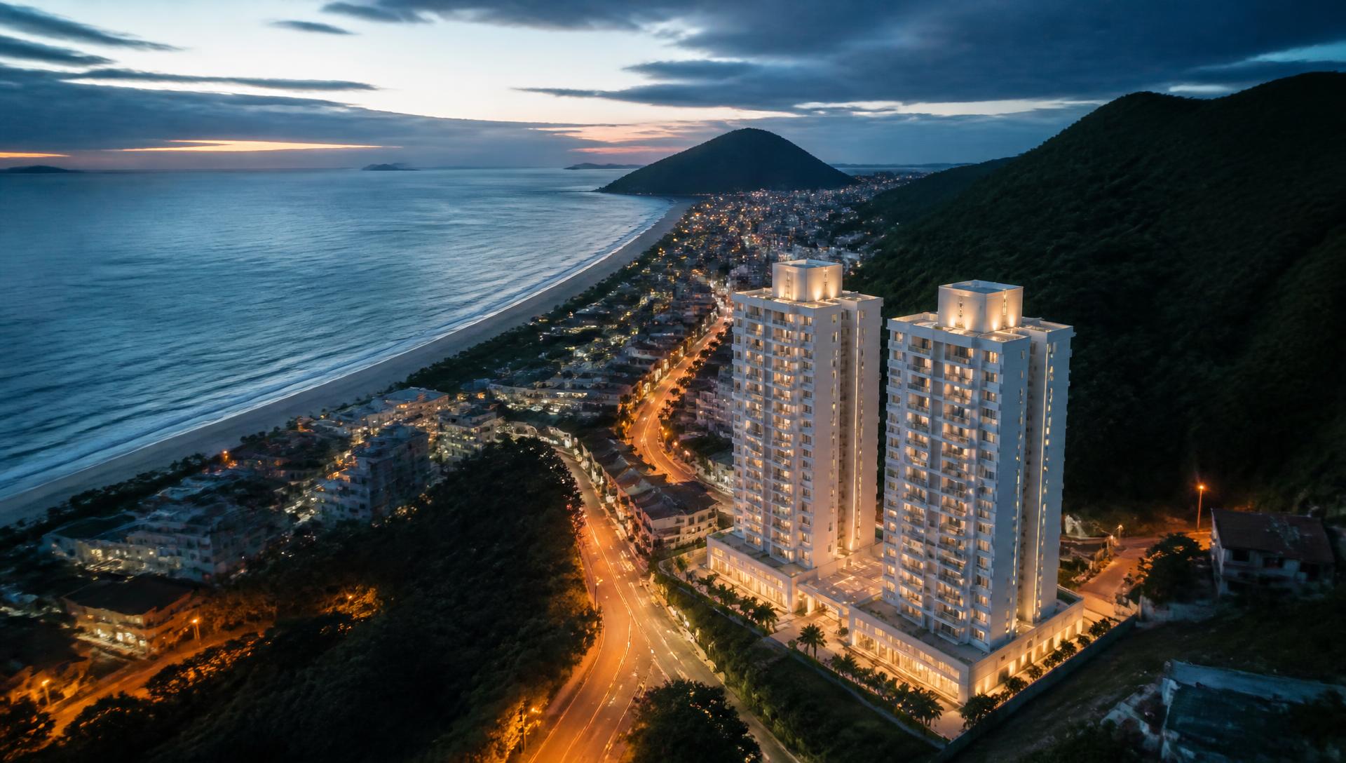 Vista aérea do litoral de Florianópolis ao entardecer com empreendimentos residenciais